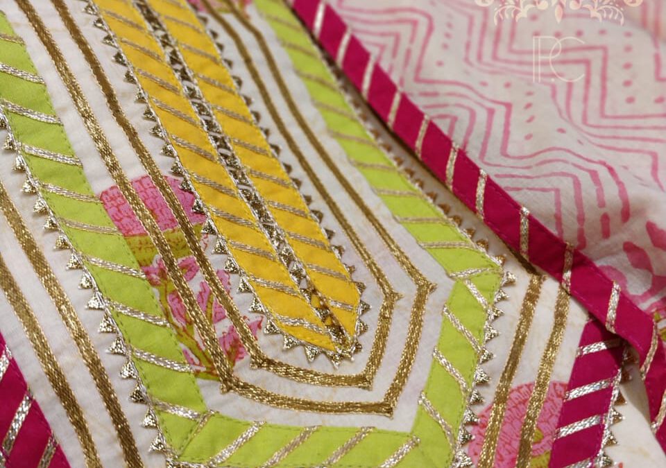 Embroidered gotta suits .