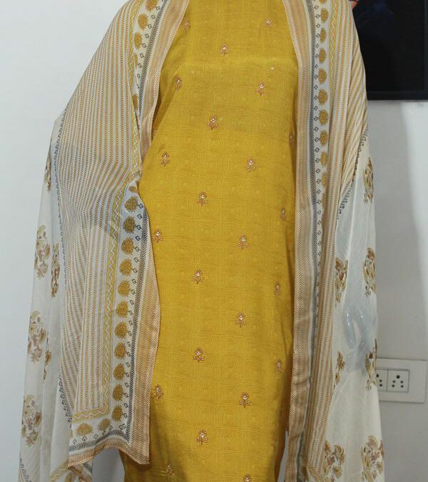 Muslin printed suits with swavoski work.