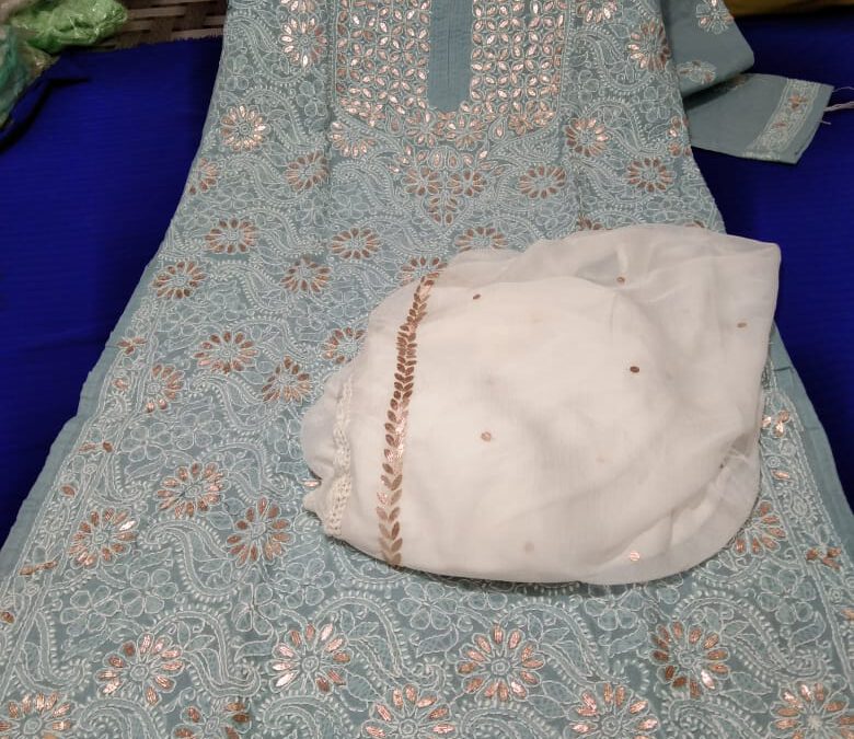 Chikan kurta with duppatta.